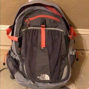 North face gray and coral recon backpack